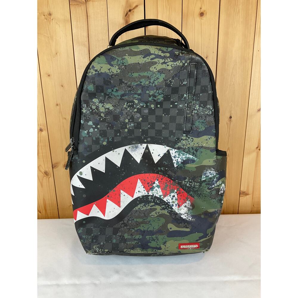Sprayground T-Rex City Camo Backpack, Black/Green Camo- about 18x12 in
